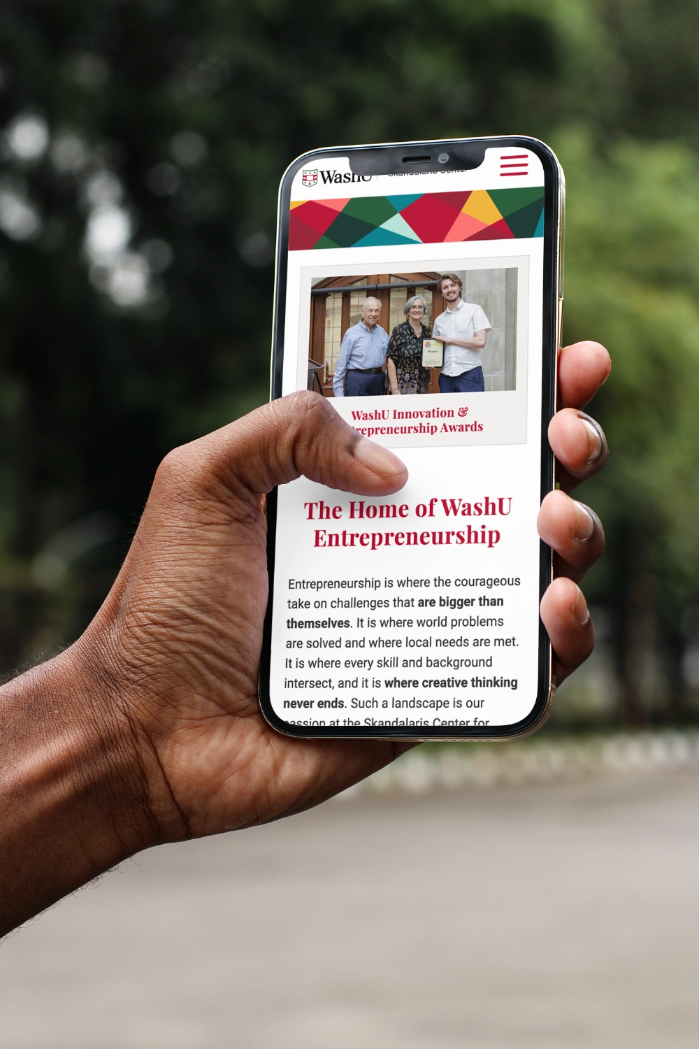 Skandalaris Center's website home page as displayed on a mobile phone.