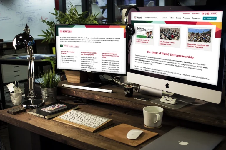 The Skandalaris Center website displayed on two computer screens.